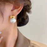 kf-S6453addef0b14e8a818dbb9c47ffc5bdJ-2023-New-French-Elegant-Gold-Color-Bean-Spliced-Flat-Pearl-Earrings-for-Korean-Fashion-Jewelry-Party