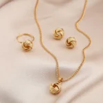 Gold Lucky Knot Jewelry Set - Twist Earrings, Necklace, and Ring