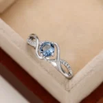 kf-S13af472c918a4019969c681b22788727T-Huitan-2022-Modern-Design-Women-s-Wedding-Rings-Charming-Blue-Cubic-Zirconia-High-Quality-Silver-Color