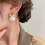 kf-S6453addef0b14e8a818dbb9c47ffc5bdJ-2023-New-French-Elegant-Gold-Color-Bean-Spliced-Flat-Pearl-Earrings-for-Korean-Fashion-Jewelry-Party